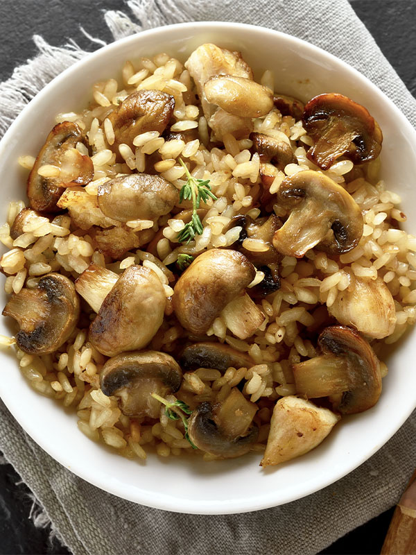 Arroz con pollo al champiñón